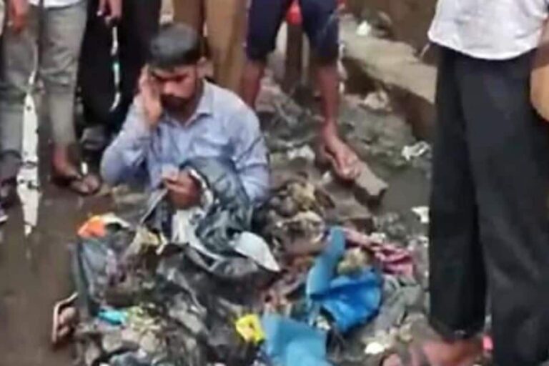 Sena MLA Dumps Garbage on Contractor, Makes Him Sit on Waterlogged Road for ‘Improper’ Drainage Work