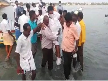 Watch: Tamil Nadu minister carried by fishermen to shore as he did not want shoes to get wet