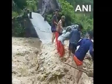 Watch: People cross river on half-damaged bridge in Uttarakhand amid gushing waves