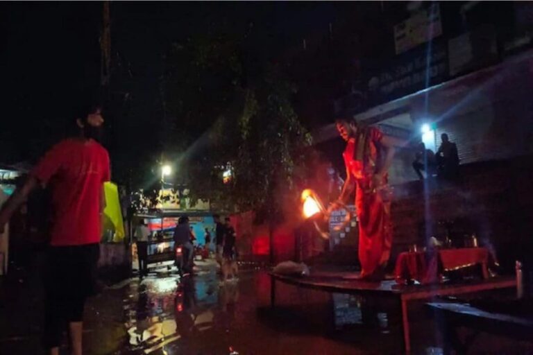 In Varanasi, Ganga Aarti On Road As River Flowing Above Danger Mark