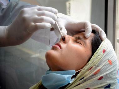 India records 12,830 new COVID-19 infections; 446 deaths; active cases lowest in 247 days