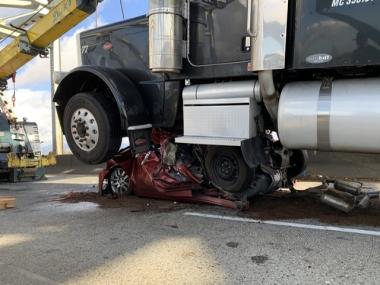 US woman survives after car crushed by an 18-wheeler truck; walks out with minor injuries