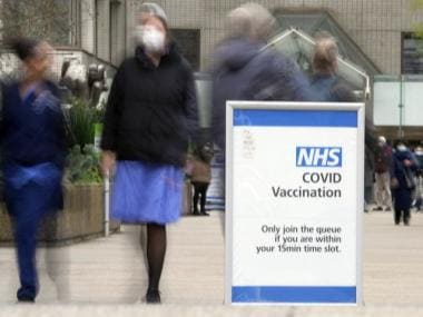 ‘An epidemic upon an epidemic’: Omicron infections drive UK’s COVID-19 cases to a record high
