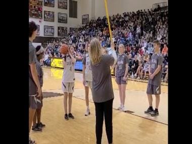 Watch: Visually-impaired girl aces shot at basketball game, crowd screams with delight