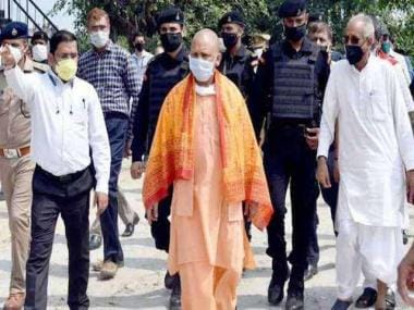 Yogi Adityanath Oath ceremony: BJP supporters offer prayers at temples, perform ‘aarti’ of bulldozers across UP