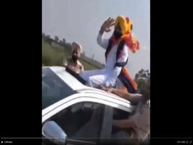 Watch | Punjab Transport Minister travels sitting on car's sunroof, video stirs controversy