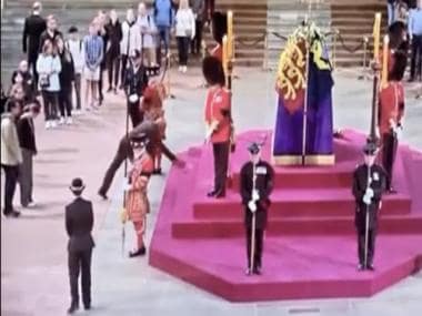 Watch: Man pays unique tribute before Queen Elizabeth's coffin; kneels down and drops coin