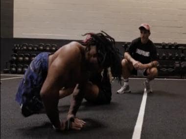 Differently-abled athlete smashes world records for most diamond push-ups and world's highest box jump