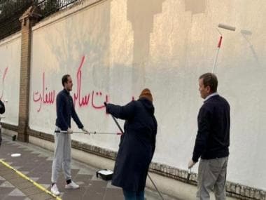 Iran militia paint anti-British slogans on Embassy walls in Tehran