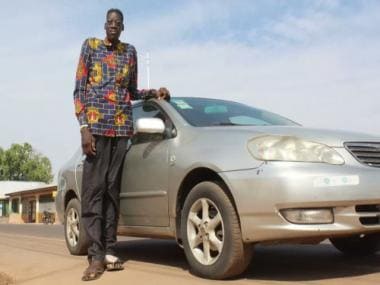 Ghana man reported to be world’s tallest at 9 foot six. But what’s the truth?