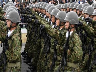 China tells Japan it is ‘deeply concerned’ by Tokyo’s military build up