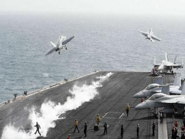 Chinese military shoos away US navy aircraft from South China sea, reports claim
